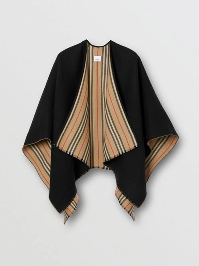 Shop Burberry Icon Stripe Wool Reversible Cape In Black