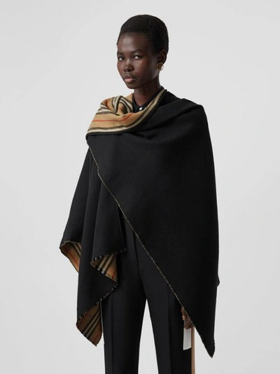 Shop Burberry Icon Stripe Wool Reversible Cape In Black