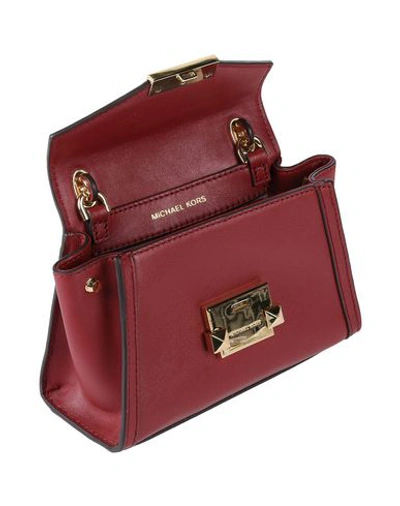 Shop Michael Michael Kors Handbags In Maroon