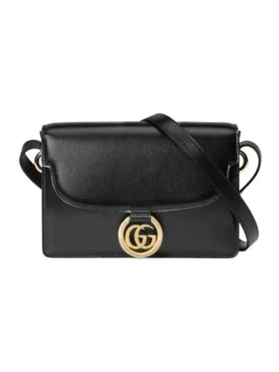 Shop Gucci Small Gg Ring Leather Shoulder Bag In Black