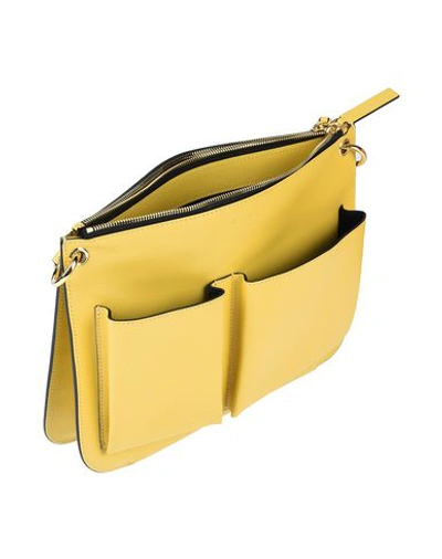 Shop Marni Cross-body Bags In Yellow