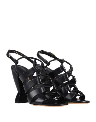 Shop Ferragamo Sandals In Black