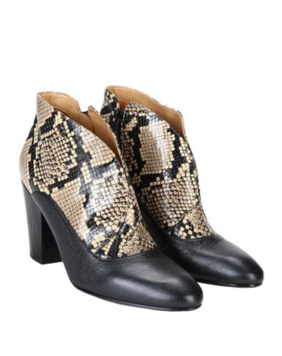 Shop Chie Mihara Ankle Boots In Beige