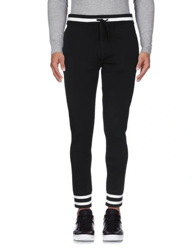 Dolce & Gabbana Knit Jogging Pants With Embroidery In Black