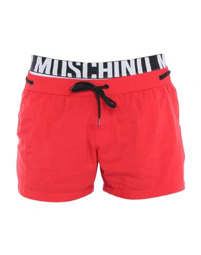 Shop Moschino Swim Trunks In Red