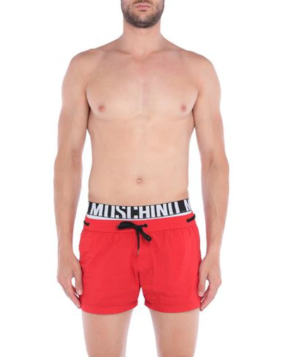 Shop Moschino Swim Trunks In Red