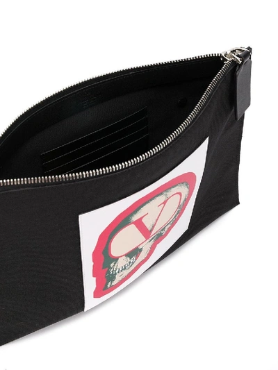 Shop Valentino Garavani X Undercover Skull Pouch