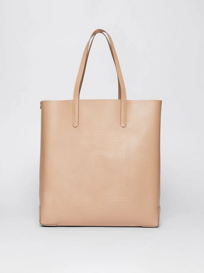 Shop Burberry Large Embossed Monogram Motif Leather Tote In Camel