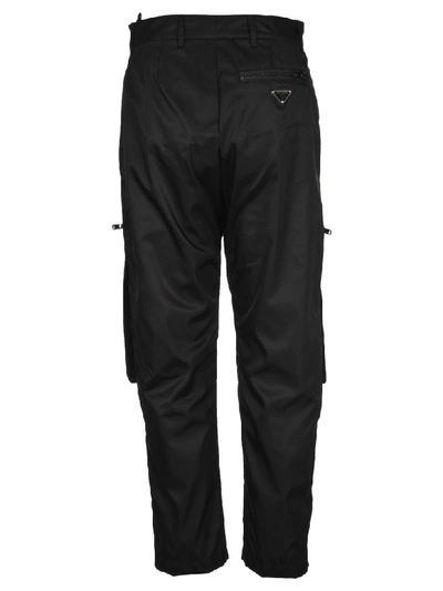 Shop Prada Cropped Cargo Trousers In Black