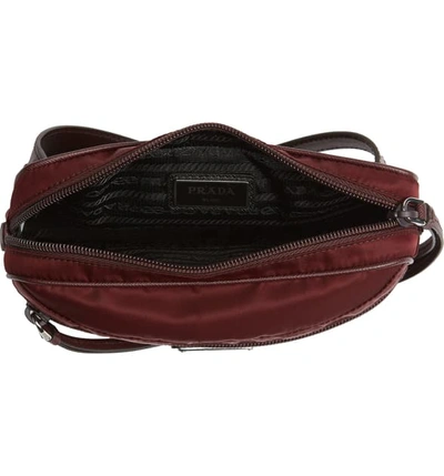 Shop Prada Small Nylon Belt Bag In Bordeaux