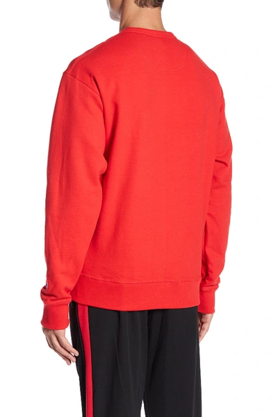 Shop Champion Graphic Powerblend Crew Neck Pullover In Team Red S