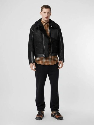 Shop Burberry Shearling And Leather Jacket In Black