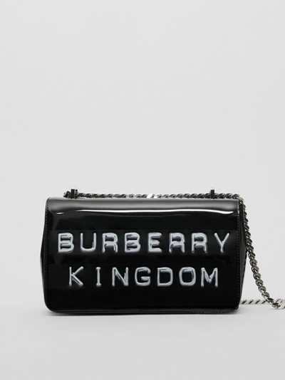 Shop Burberry Small Tape Print Laminated Lola Bag In Black