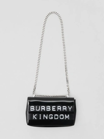 Shop Burberry Small Tape Print Laminated Lola Bag In Black