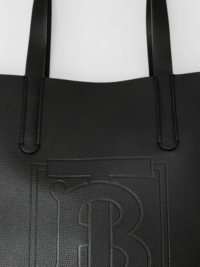 Shop Burberry Embossed Monogram Motif Leather Tote In Black