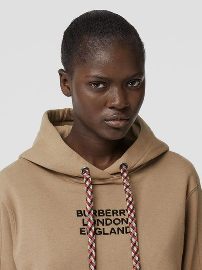 Shop Burberry Embroidered Logo Cotton Oversized Hoodie In Archive Beige