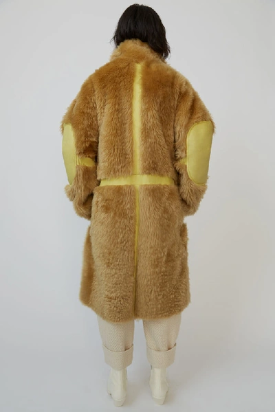 Shop Acne Studios Shearling Coat Mustard Yellow/pale Yellow