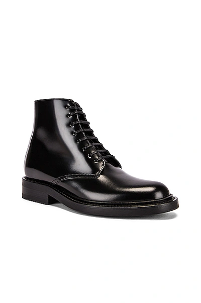 Shop Saint Laurent Army Lace Up Leather Booties In Black