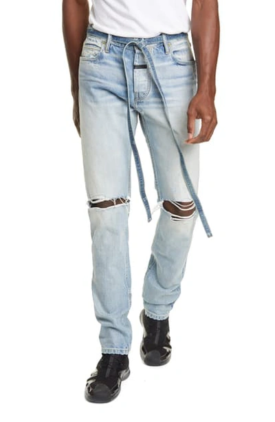 Shop Fear Of God Distressed Tie Waist Slim Leg Jeans In Vintage Indigo