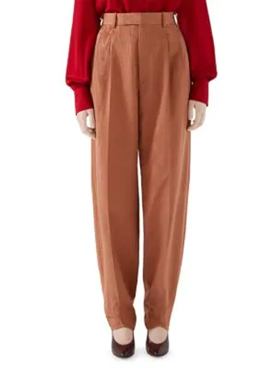 Shop Gucci Moiré Tapered-leg Trousers In Tenne