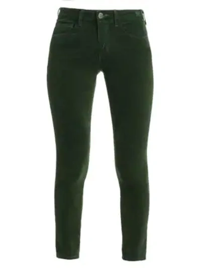 Shop L Agence Margot High-rise Velvet Skinny Ankle Jeans In Moss