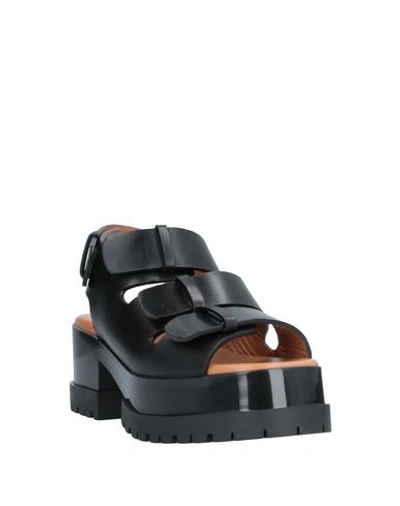 Shop Clergerie Sandals In Black