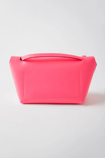 Shop Acne Studios Mini Purse Fluo Pink