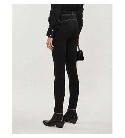 Shop Sandro Belted Mid-rise Stretch-woven Trousers In Black
