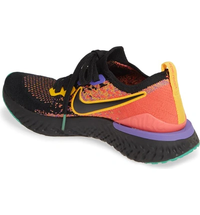 Shop Nike Epic React Flyknit 2 Running Shoe In Black/ Black/ Ember Glow/ Gold
