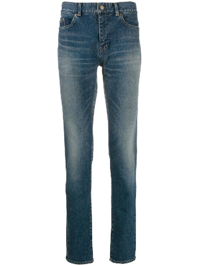 Shop Saint Laurent Faded Mid-rise Slim Jeans