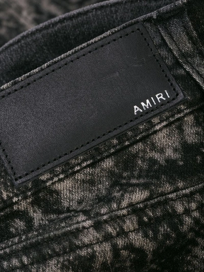 Shop Amiri Grey And Black Laser Python Stack Jean