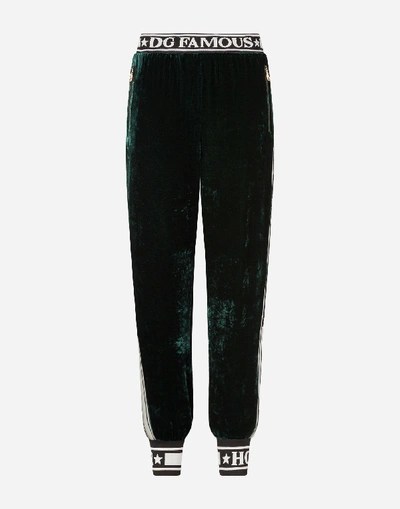 Shop Dolce & Gabbana Fluid Velvet Jogging Pants In Green