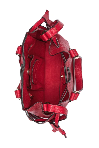 Shop Steve Madden Mini Bucket Crossbody Bag In Red