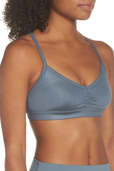 Shop Alo Yoga Sunny Strappy Yoga Bra In Concrete Glossy