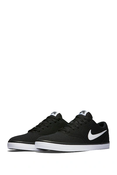 Shop Nike Sb Check Solar Canvas Sneaker In 001 Black/white
