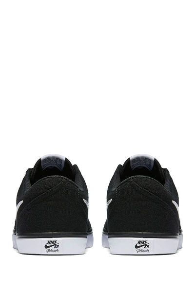 Shop Nike Sb Check Solar Canvas Sneaker In 001 Black/white
