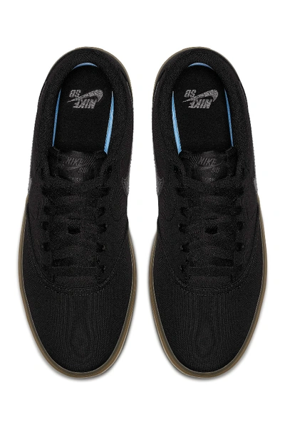 Shop Nike Sb Check Solar Canvas Sneaker In Black/black
