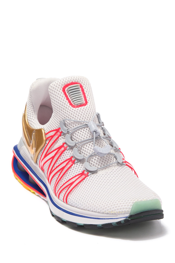 nike shox gravity vast grey metallic gold