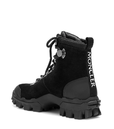 Shop Moncler Helis Suede Ankle Boots In Black