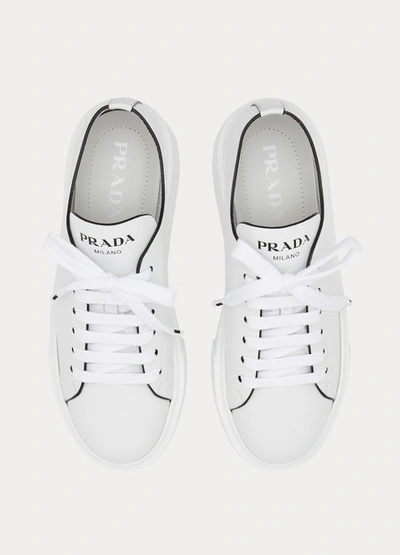 Shop Prada Wedge Sneakers In White