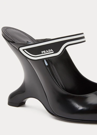 Shop Prada High-heeled Mules In Black