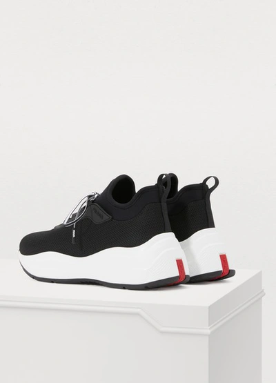 Shop Prada Low-top Sneakers In Nero/bianco