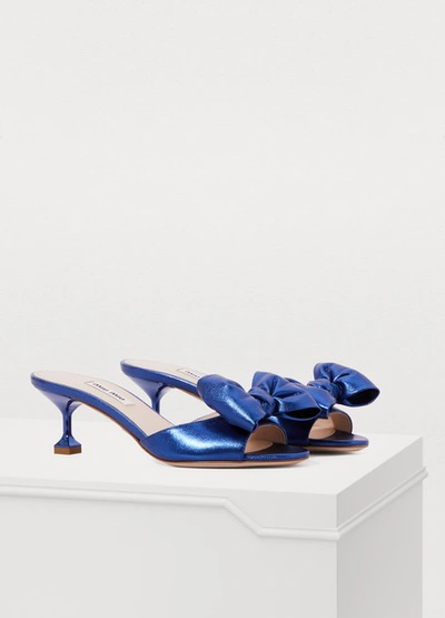 Shop Miu Miu Bow Mules In Mettalic Blue