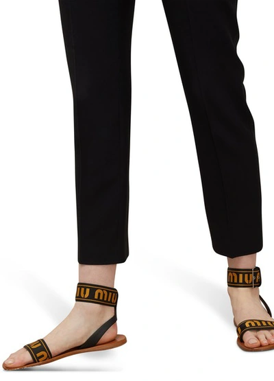 Shop Miu Miu Logo Sandals In Kaki+nero