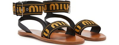 Shop Miu Miu Logo Sandals In Kaki+nero