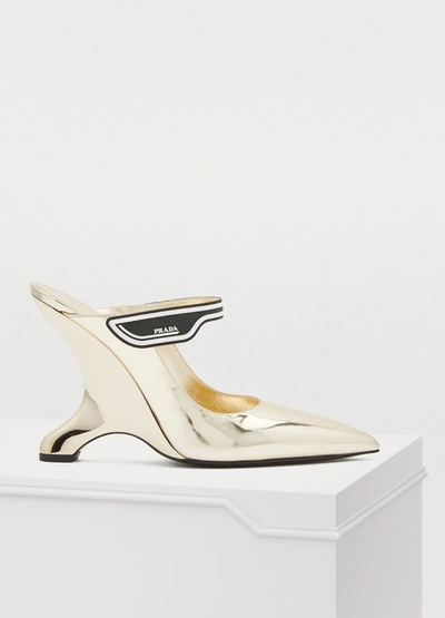 Shop Prada High-heeled Mules In Gold