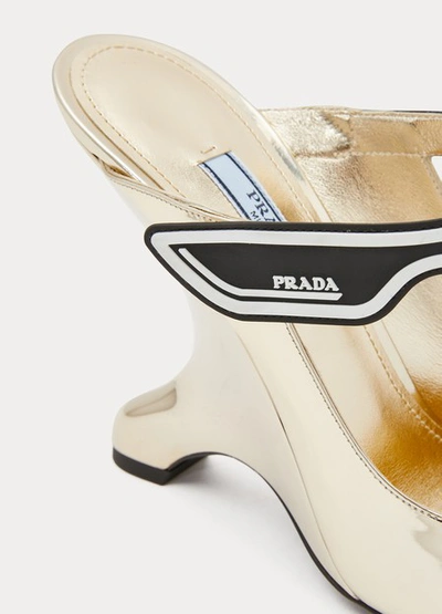 Shop Prada High-heeled Mules In Gold