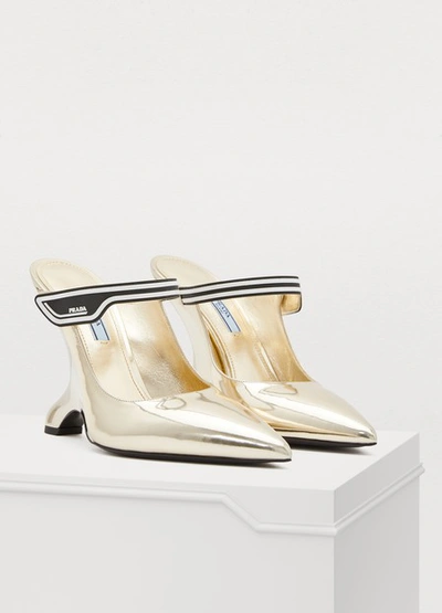 Shop Prada High-heeled Mules In Gold