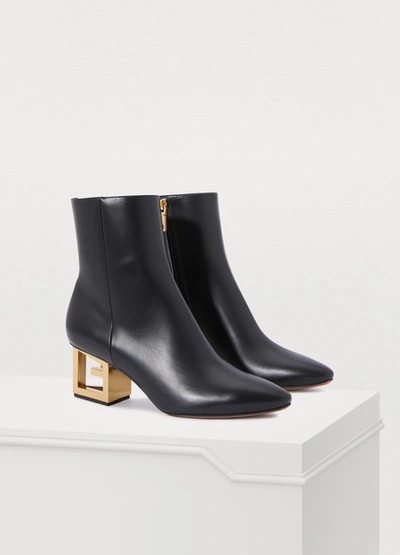 Shop Givenchy Triangle Ankle Boots In Noir