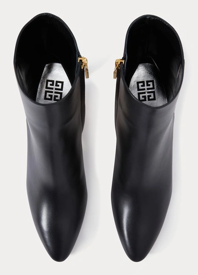 Shop Givenchy Triangle Ankle Boots In Noir